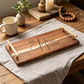 Engraved Acacia Serving Tray with Handles: engraved acacia serving tray with gold-tone handles on a linen-covered table