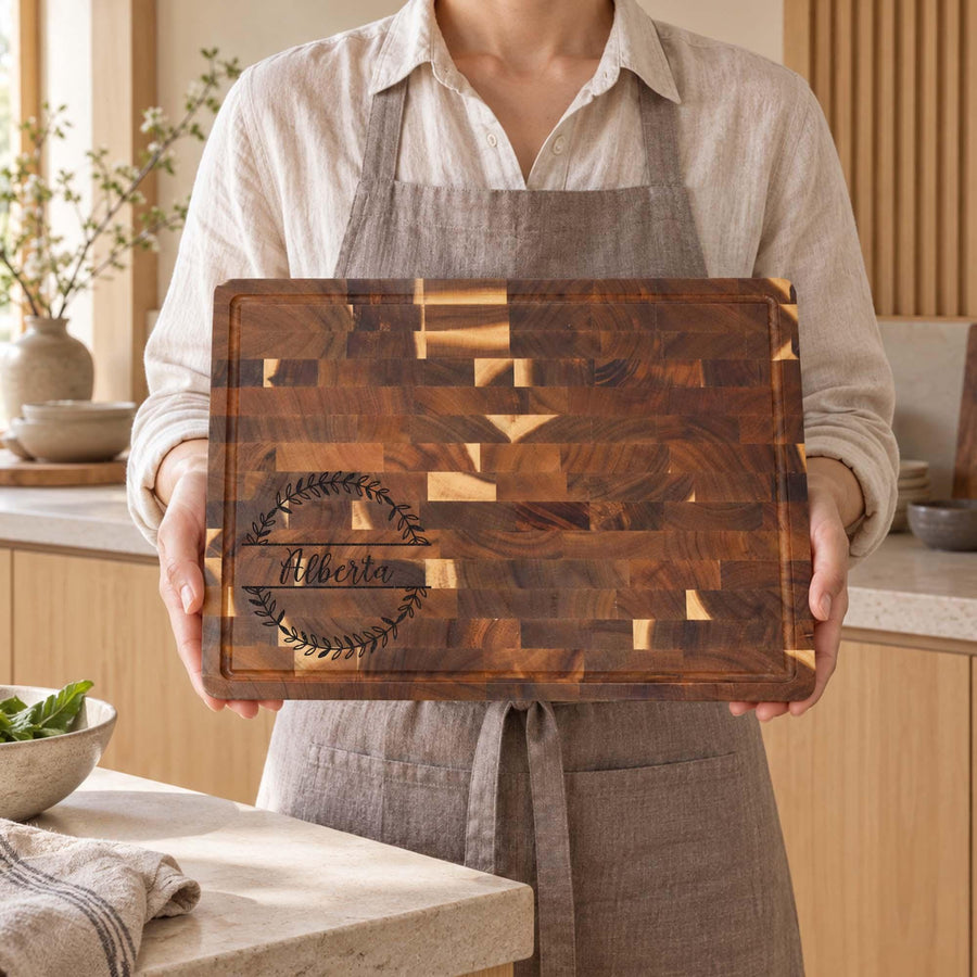 Engraved Waffle-Pattern End-Grain Board: waffle-pattern end-grain board held in front of an apron