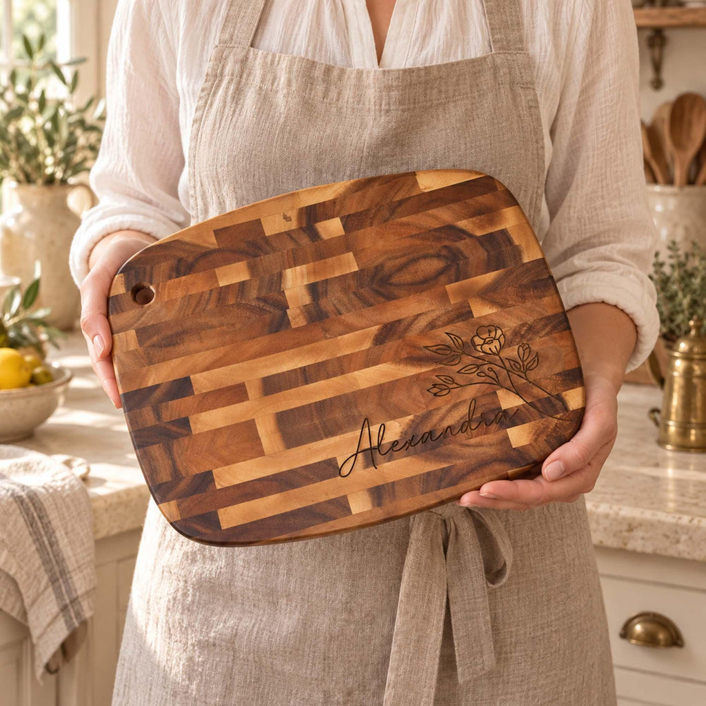 Personalised Reversible End-Grain Acacia Board: rounded end-grain acacia board held at an angle